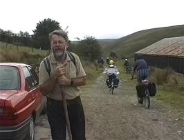Our warden, Roger, chats with Michael as we start out on the 2.4 mile track shortcut from Tyncornel youth hostel